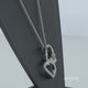 Load and play video in Gallery viewer, Jewelili Sterling Silver With Diamonds Intertwined Double Heart Pendant Necklace
