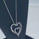 Load and play video in Gallery viewer, Jewelili Sterling Silver with 1/4 CTTW Diamonds Heart Shape Pendant Necklace
