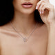 Load image into Gallery viewer, Jewelili Double Heart Pendant Necklace with Natural White Round Diamonds in Rose Gold over Sterling Silver 1/10 CTTW View 2
