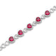 Load image into Gallery viewer, Jewelili Heart Shape Bracelet with Created Ruby and Created White Sapphire in Sterling Silver View 2
