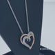 Load and play video in Gallery viewer, Jewelili 14K Rose Gold Over Sterling Silver With 1/10 CTTW Diamonds Heart Shape Pendant Necklace
