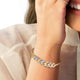 Load image into Gallery viewer, Jewelili Bangle Bracelet with Natural White Diamonds in Yellow Gold over Brass View 3
