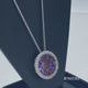 Load and play video in Gallery viewer, Jewelili Sterling Silver with Round Garnet Amethyst Pink Toumaline with Round Created White Sapphire Halo Pendant Necklace
