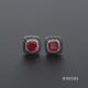 Load and play video in Gallery viewer, Jewelili Sterling Silver Created Ruby with Treated Black Diamonds and White Diamonds Stud Earrings
