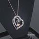 Load and play video in Gallery viewer, Jewelili Sterling Silver and 10K Rose Gold Natural White Round Diamonds Double Heart Shape Pendant Necklace
